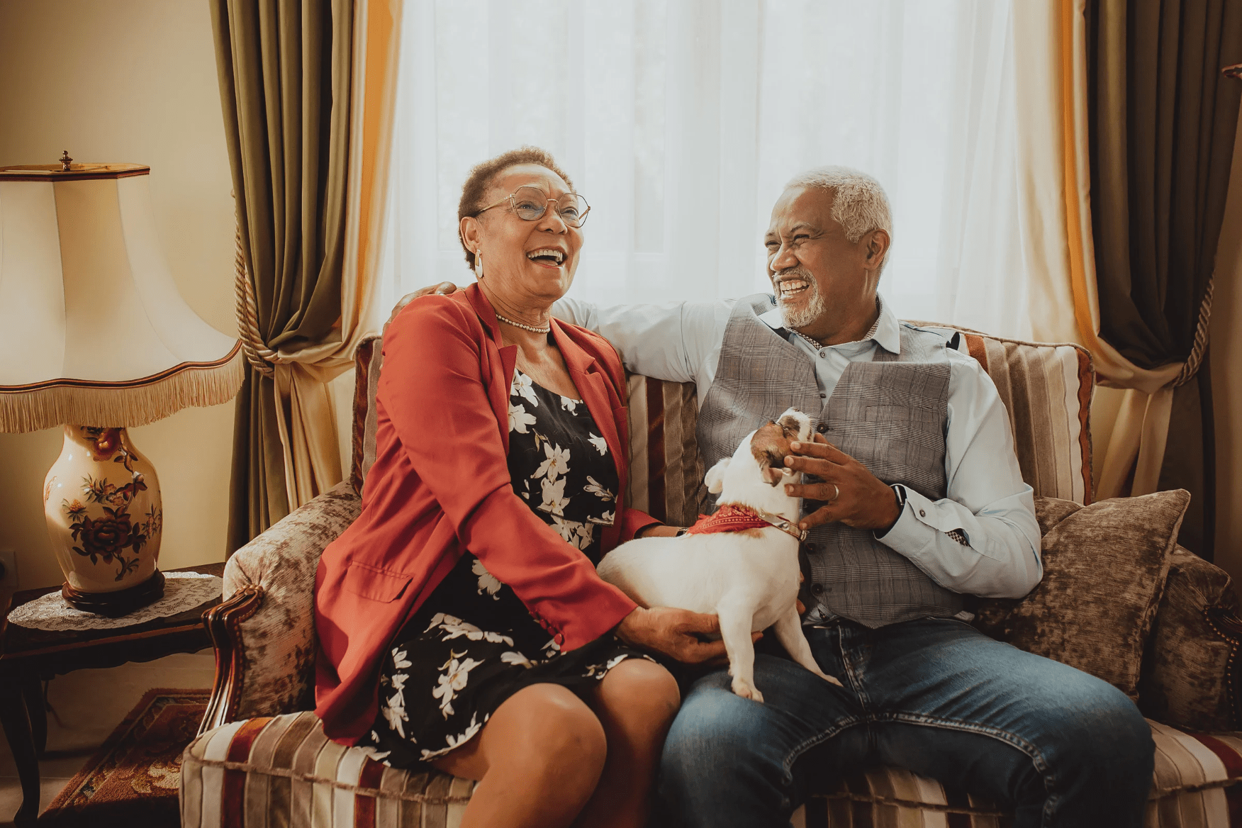 Happy couple after successful treatment with neck and back pain specialist.